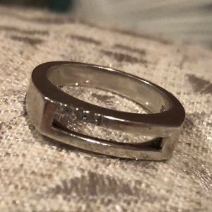 Brushed sterling silver modern ring with diamonds